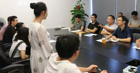 97国际首届员工转正评审会圆满进行